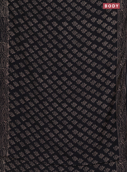 Semi pashmina silk saree black and cream with allover butta prints and crocia lace work border