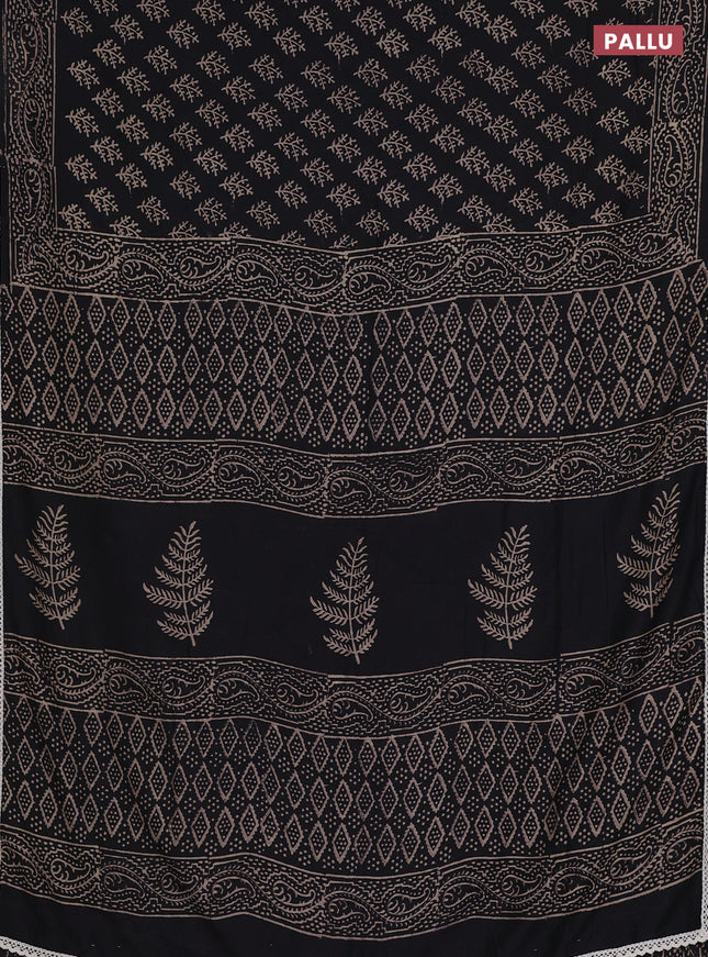 Semi pashmina silk saree black and cream with allover butta prints and crocia lace work border