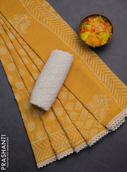 Semi pashmina silk saree yellow and cream with allover prints and crocia lace work border