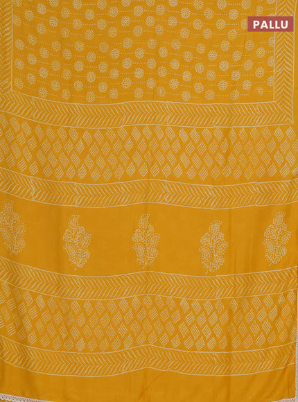 Semi pashmina silk saree yellow and cream with allover prints and crocia lace work border