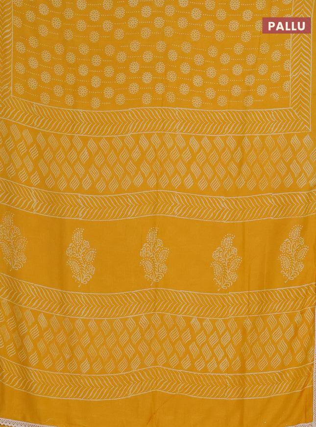 Semi pashmina silk saree yellow and cream with allover prints and crocia lace work border