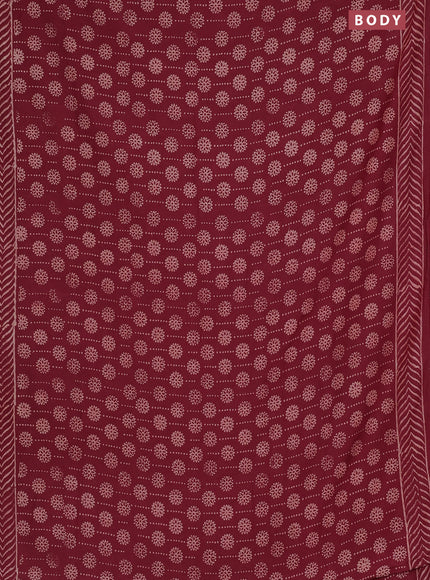 Semi pashmina silk saree maroon and cream with allover prints and crocia lace work border