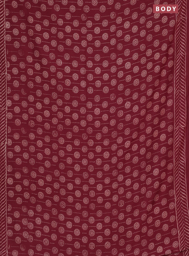 Semi pashmina silk saree maroon and cream with allover prints and crocia lace work border