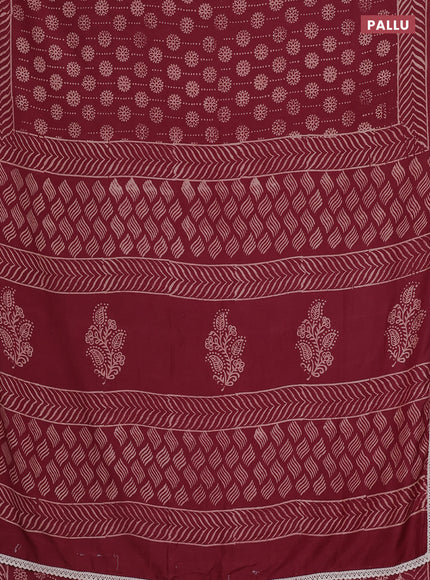 Semi pashmina silk saree maroon and cream with allover prints and crocia lace work border