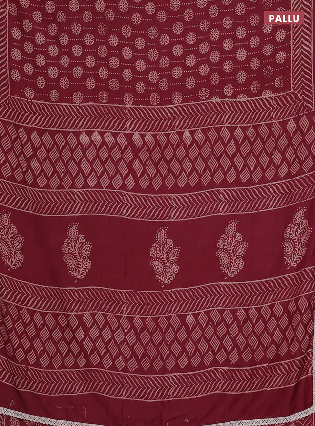 Semi pashmina silk saree maroon and cream with allover prints and crocia lace work border