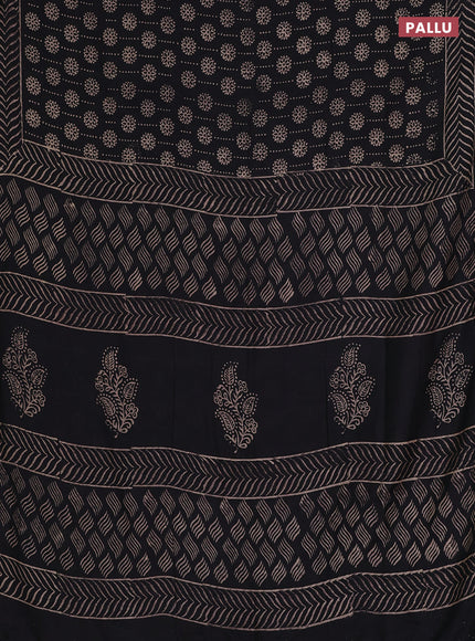 Semi pashmina silk saree black and cream with allover prints and crocia lace work border