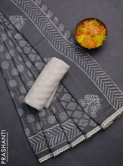 Semi pashmina silk saree grey and cream with allover prints and crocia lace work border