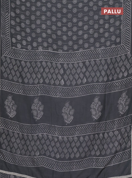 Semi pashmina silk saree grey and cream with allover prints and crocia lace work border