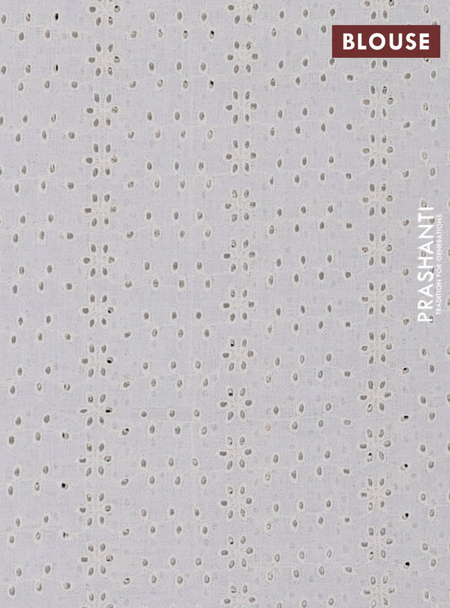 Semi pashmina silk saree black and cream with allover butta prints and crocia lace work border