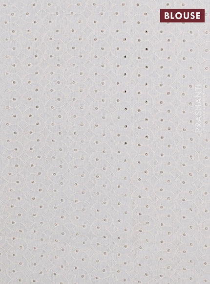 Semi pashmina silk saree black and cream with allover butta prints and crocia lace work border