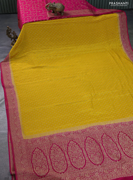 Banarasi crepe partly saree yellow and pink with allover thread & zari woven butta weaves and woven border