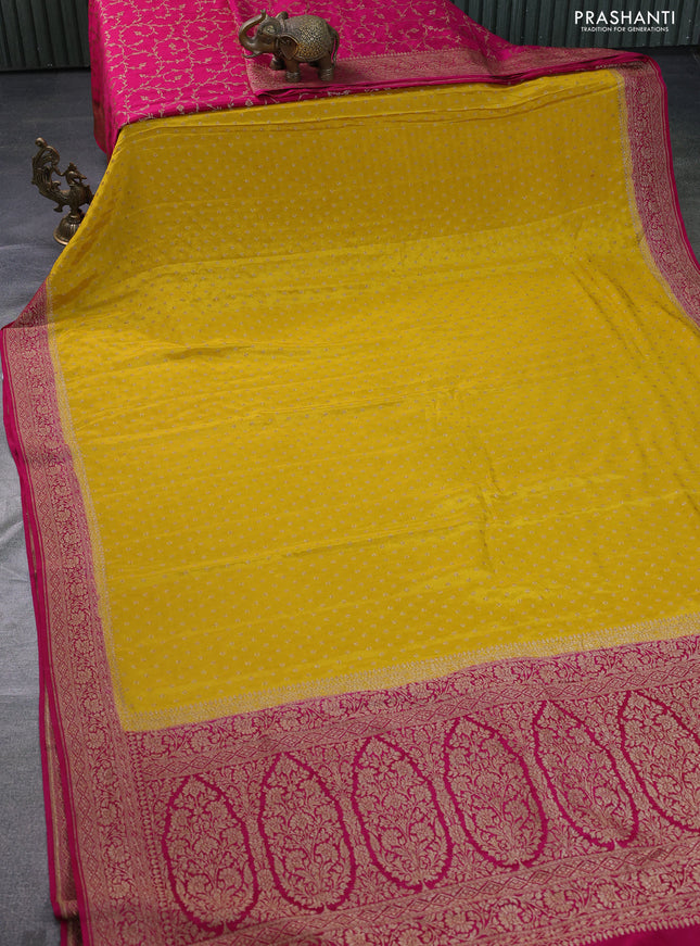 Banarasi crepe partly saree yellow and pink with allover thread & zari woven butta weaves and woven border