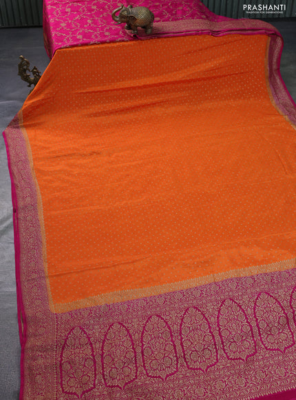 Banarasi crepe partly saree orange and pink with allover thread & zari woven butta weaves and woven border