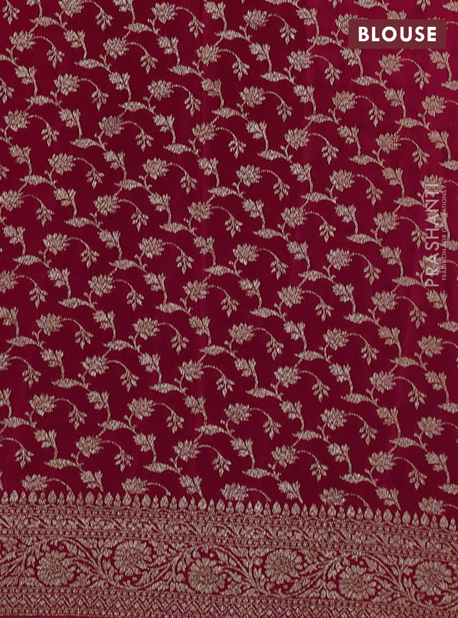 Banarasi crepe partly saree black and dark pink with allover thread & zari woven butta weaves and woven border