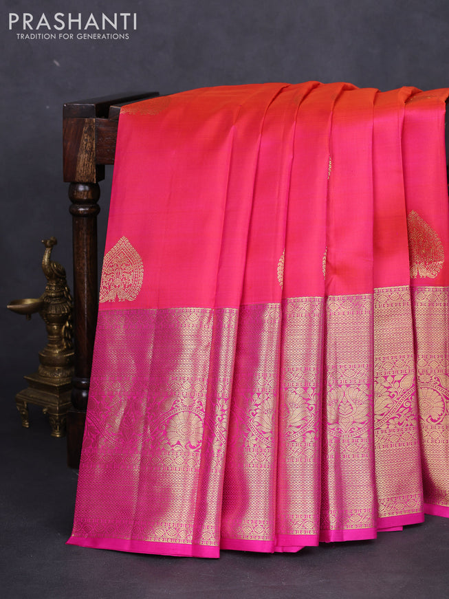 Pure kanchipuram silk saree dual shade of pinkish orange and pink with zari woven buttas and long zari woven border