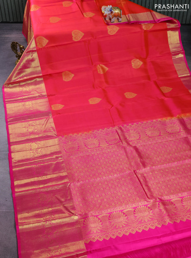 Pure kanchipuram silk saree dual shade of pinkish orange and pink with zari woven buttas and long zari woven border