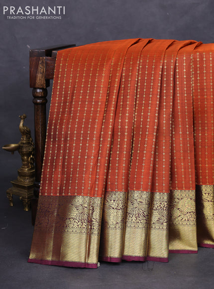 Pure kanchipuram silk saree orange and wine shade with allover zari weaves and zari woven border