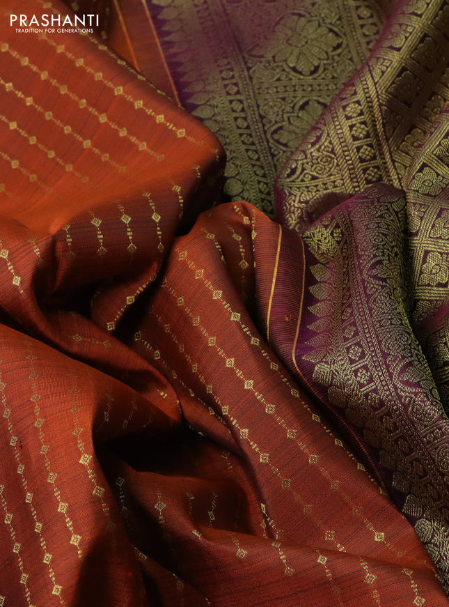 Pure kanchipuram silk saree orange and wine shade with allover zari weaves and zari woven border