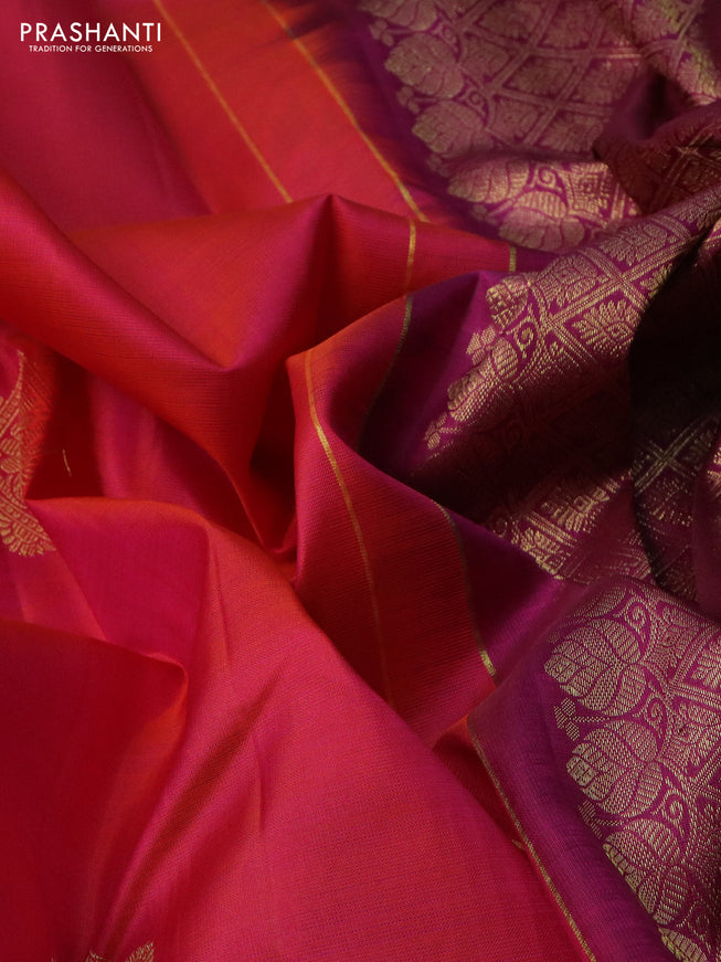 Pure kanchipuram silk saree dual shade of pinkish orange and purple with zari woven buttas and zari woven border