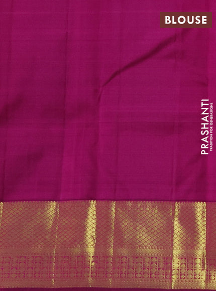 Pure kanchipuram silk saree dual shade of pinkish orange and purple with zari woven buttas and zari woven border