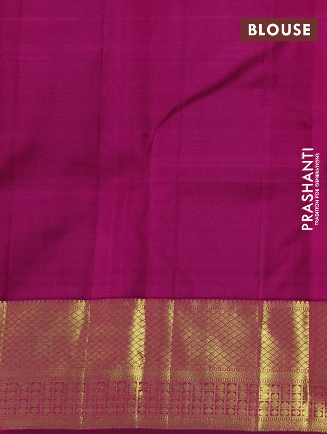 Pure kanchipuram silk saree dual shade of pinkish orange and purple with zari woven buttas and zari woven border