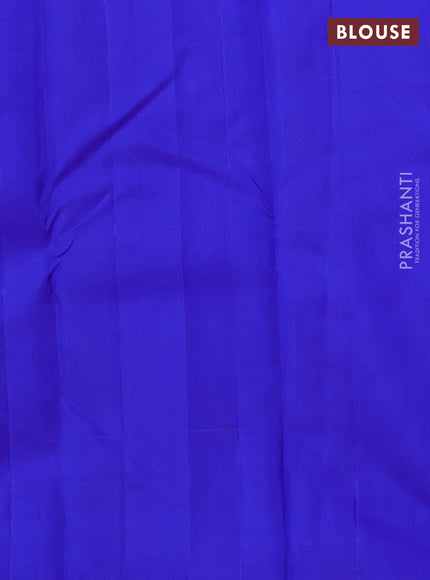 Pure kanchipuram silk saree dual shade of teal blue and royal blue with paisley zari woven buttas in borderless style
