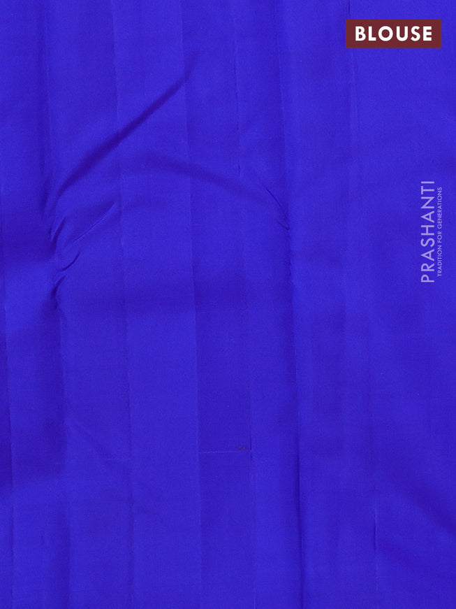 Pure kanchipuram silk saree dual shade of teal blue and royal blue with paisley zari woven buttas in borderless style