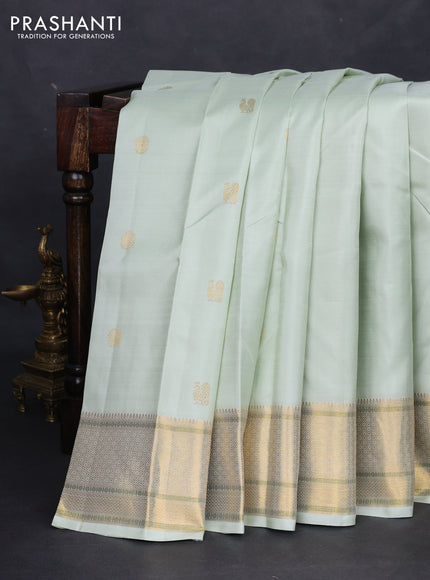 Pure kanchipuram silk saree pista green with annam zari woven buttas and zari woven border
