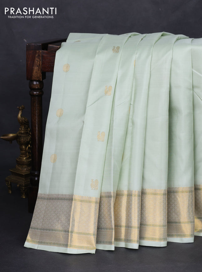Pure kanchipuram silk saree pista green with annam zari woven buttas and zari woven border