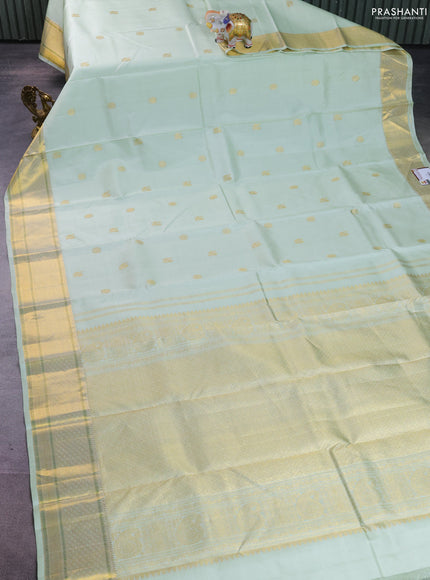 Pure kanchipuram silk saree pista green with annam zari woven buttas and zari woven border