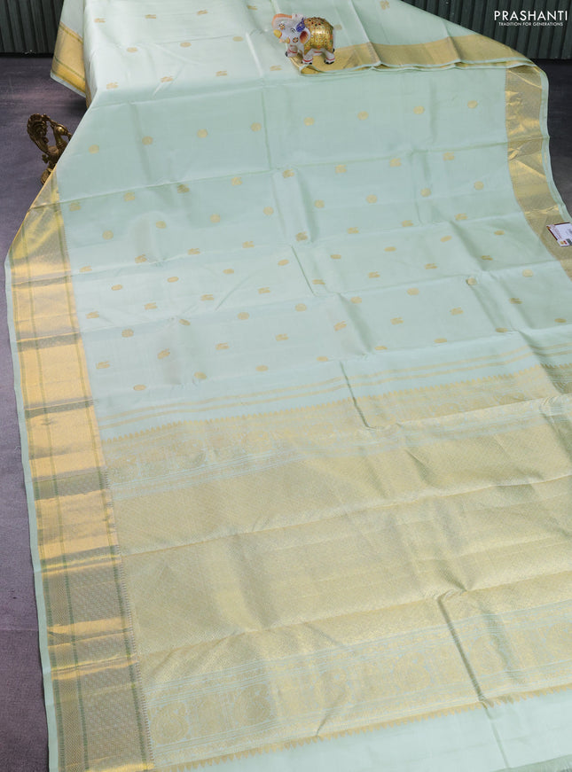 Pure kanchipuram silk saree pista green with annam zari woven buttas and zari woven border