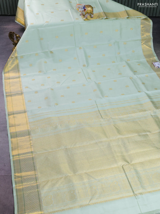 Pure kanchipuram silk saree pista green with annam zari woven buttas and zari woven border