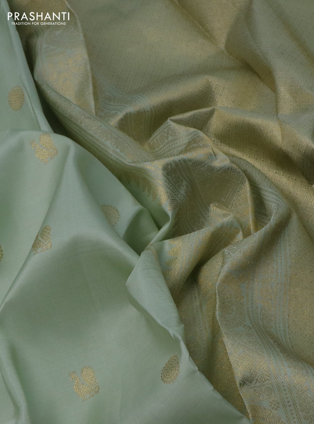 Pure kanchipuram silk saree pista green with annam zari woven buttas and zari woven border