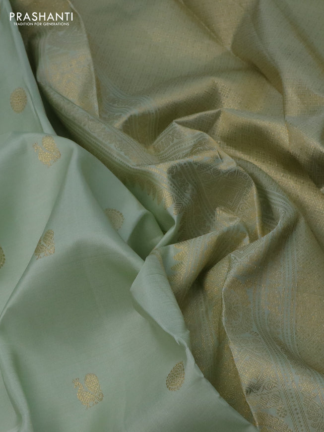 Pure kanchipuram silk saree pista green with annam zari woven buttas and zari woven border