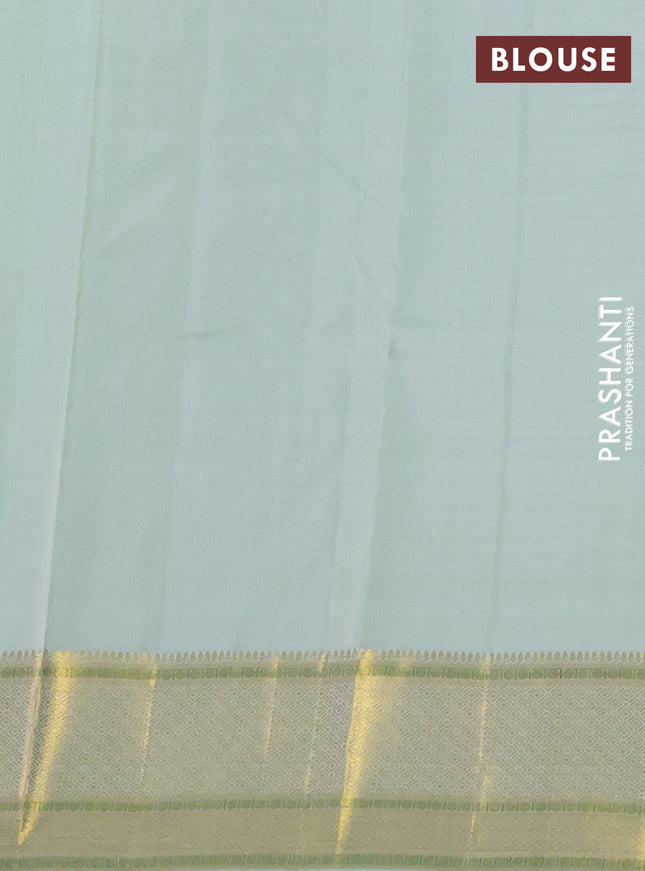 Pure kanchipuram silk saree pista green with annam zari woven buttas and zari woven border