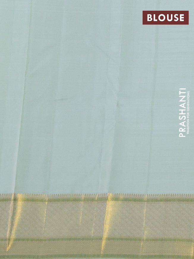 Pure kanchipuram silk saree pista green with annam zari woven buttas and zari woven border