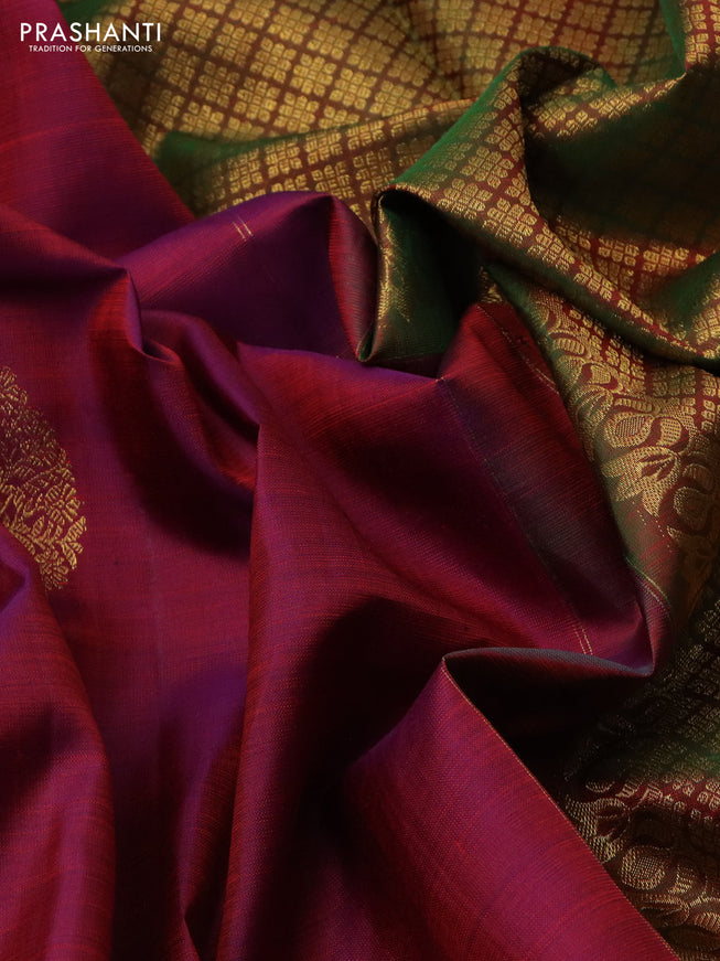 Pure kanchipuram silk saree dual shade of maroonish blue and dual shade of green with zari woven buttas and floral design zari woven border