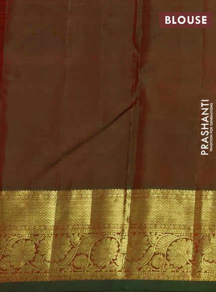 Pure kanchipuram silk saree dual shade of maroonish blue and dual shade of green with zari woven buttas and floral design zari woven border