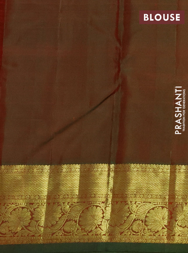 Pure kanchipuram silk saree dual shade of maroonish blue and dual shade of green with zari woven buttas and floral design zari woven border