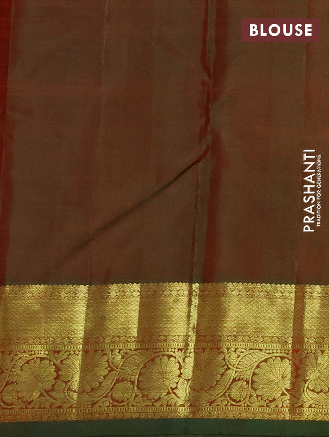 Pure kanchipuram silk saree dual shade of maroonish blue and dual shade of green with zari woven buttas and floral design zari woven border