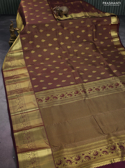 Pure kanchipuram silk saree deep maroon with allover small zari checks & buttas and long zari woven border