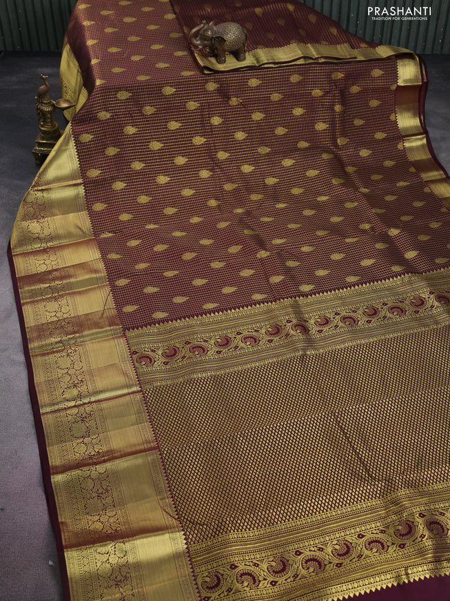 Pure kanchipuram silk saree deep maroon with allover small zari checks & buttas and long zari woven border