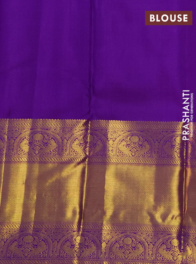 Pure kanchipuram silk saree purple with zari woven buttas and long zari woven border