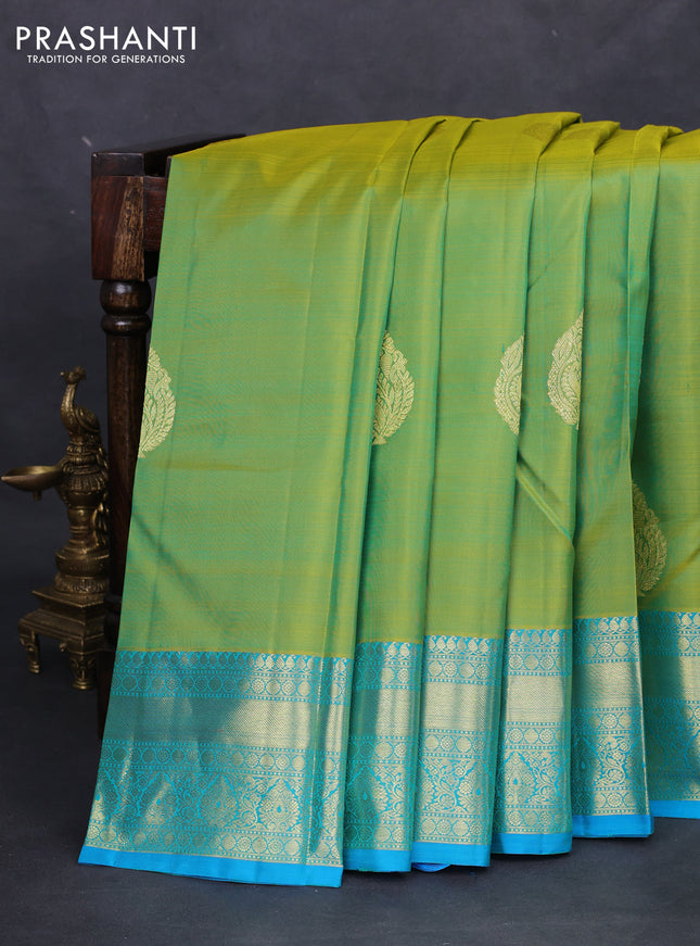 Pure kanchipuram silk saree light green and teal blue with zari woven buttas and zari woven border