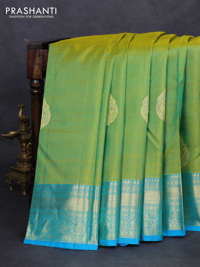 Pure kanchipuram silk saree light green and teal blue with zari woven buttas and zari woven border