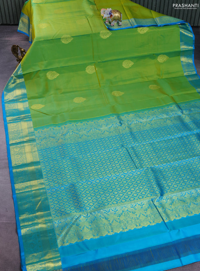 Pure kanchipuram silk saree light green and teal blue with zari woven buttas and zari woven border