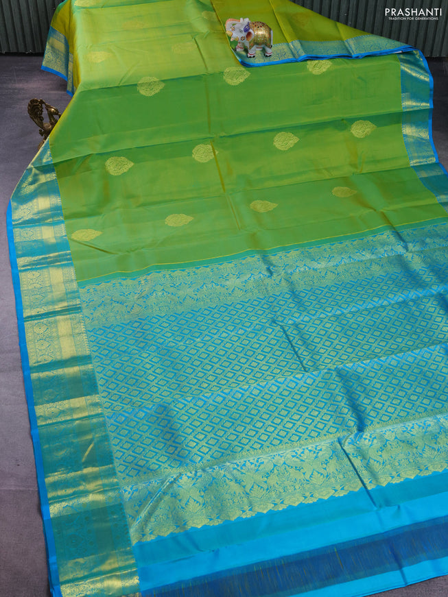 Pure kanchipuram silk saree light green and teal blue with zari woven buttas and zari woven border
