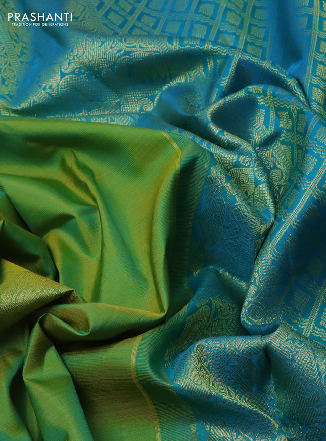 Pure kanchipuram silk saree light green and teal blue with zari woven buttas and zari woven border