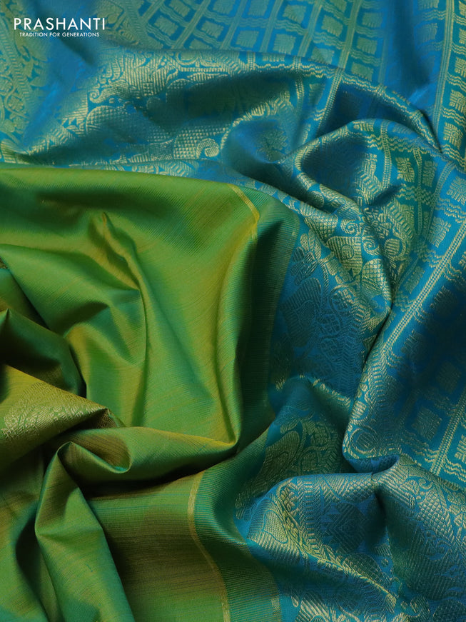 Pure kanchipuram silk saree light green and teal blue with zari woven buttas and zari woven border