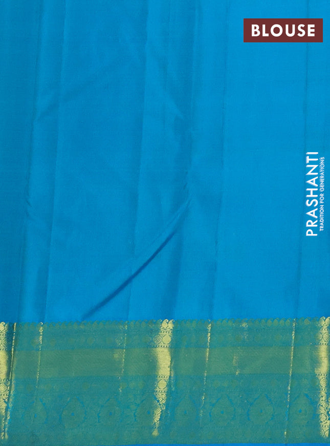 Pure kanchipuram silk saree light green and teal blue with zari woven buttas and zari woven border
